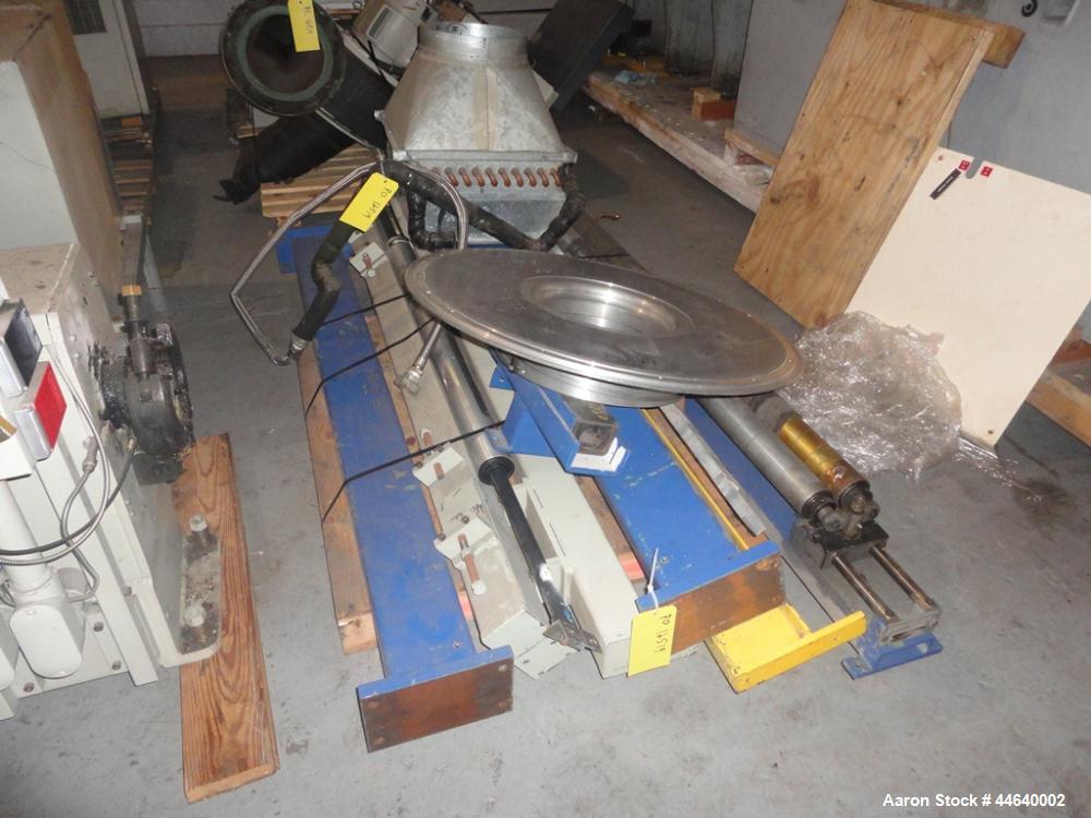 Used Battenfeld Three Layer Blown Film Line consisting of the following: 2" Battenfeld extruder, 30:1 L/D, electrically heated, water cooled, feed hopper with 50 hp DC motor with SCR controller, 2" B...