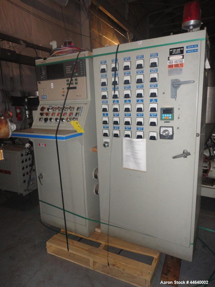 Used Battenfeld Three Layer Blown Film Line consisting of the following: 2" Battenfeld extruder, 30:1 L/D, electrically heated, water cooled, feed hopper with 50 hp DC motor with SCR controller, 2" B...