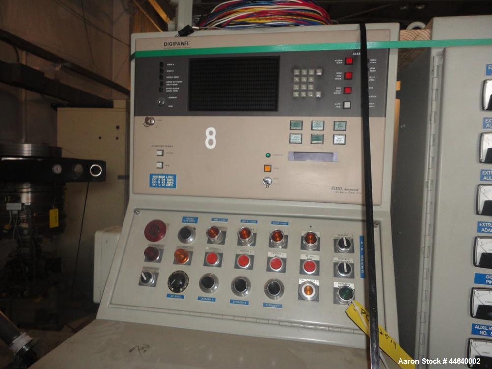 Used Battenfeld Three Layer Blown Film Line consisting of the following: 2" Battenfeld extruder, 30:1 L/D, electrically heated, water cooled, feed hopper with 50 hp DC motor with SCR controller, 2" B...