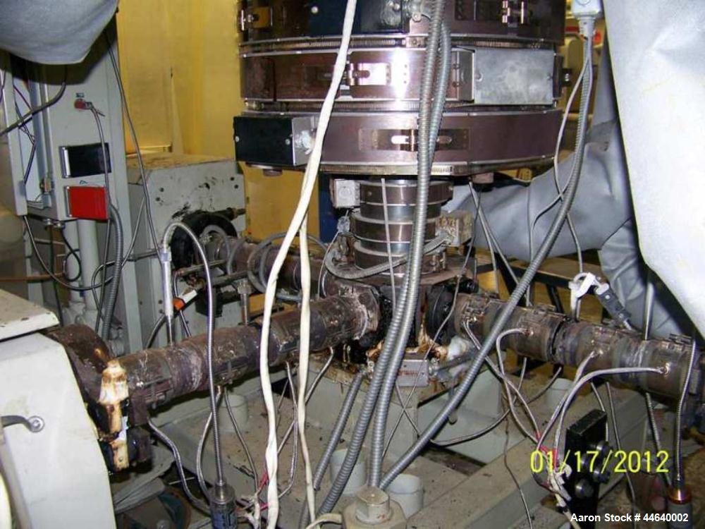 Used Battenfeld Three Layer Blown Film Line consisting of the following: 2" Battenfeld extruder, 30:1 L/D, electrically heated, water cooled, feed hopper with 50 hp DC motor with SCR controller, 2" B...