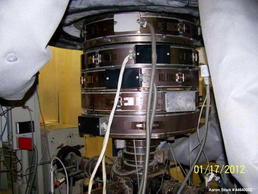 Used Battenfeld Three Layer Blown Film Line consisting of the following: 2" Battenfeld extruder, 30:1 L/D, electrically heated, water cooled, feed hopper with 50 hp DC motor with SCR controller, 2" B...