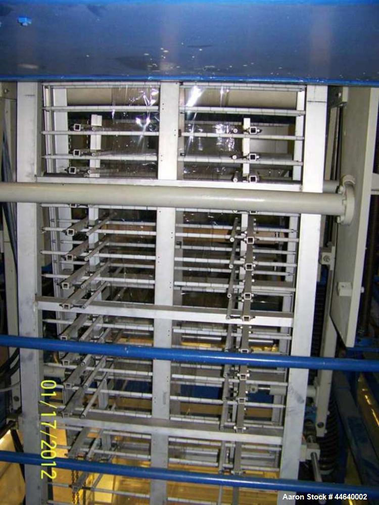 Used Battenfeld Three Layer Blown Film Line consisting of the following: 2" Battenfeld extruder, 30:1 L/D, electrically heated, water cooled, feed hopper with 50 hp DC motor with SCR controller, 2" B...
