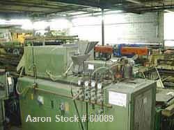 USED: Brabender downward lab line with a 1" extruder with variablespeed motor and a 1" blown film die. Includes a 4 zone temperaturecontroller with: extruder variable pot and digital rpm gauge, varia...