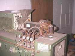 USED: Brabender downward lab line with a 1" extruder with variablespeed motor and a 1" blown film die. Includes a 4 zone temperaturecontroller with: extruder variable pot and digital rpm gauge, varia...