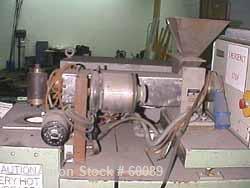 USED: Brabender downward lab line with a 1" extruder with variablespeed motor and a 1" blown film die. Includes a 4 zone temperaturecontroller with: extruder variable pot and digital rpm gauge, varia...