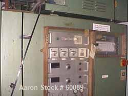 USED: Brabender downward lab line with a 1" extruder with variablespeed motor and a 1" blown film die. Includes a 4 zone temperaturecontroller with: extruder variable pot and digital rpm gauge, varia...