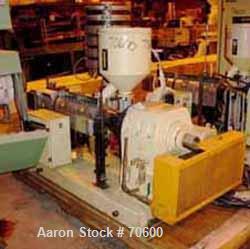 USED: Blown film line consisting of: (1) Kuhne type K45-24D 48mm(1.88") single screw extruder, approx 24:1 L/D ratio, electricallyheated, air cooled. Water cooled feed throat with hopper. Driven bya ...