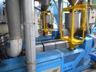 Used- Ghioldi Blown Film Co-Extrusion Line. Including: N. 2 extruders diameter mm.55, 78 kW 30 L/D N. 1 extruder diameter 75...