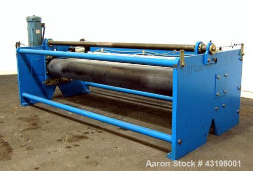 Used Nip Roll Assembly Consisting Of: (1) 10" Diameter x 84" long stationary metal roll, driven by a 3hp, 180 volt, 1750 rpm DC gear motor, ratio 15 to 1, (1) 10" diameter x 84" wide pneumatically ad...