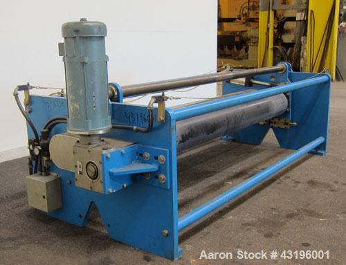 Used Nip Roll Assembly Consisting Of: (1) 10" Diameter x 84" long stationary metal roll, driven by a 3hp, 180 volt, 1750 rpm DC gear motor, ratio 15 to 1, (1) 10" diameter x 84" wide pneumatically ad...