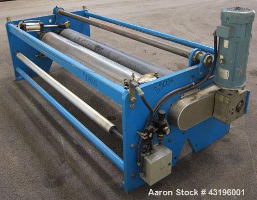 Used Nip Roll Assembly Consisting Of: (1) 10" Diameter x 84" long stationary metal roll, driven by a 3hp, 180 volt, 1750 rpm DC gear motor, ratio 15 to 1, (1) 10" diameter x 84" wide pneumatically ad...