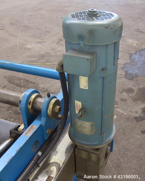 Used Nip Roll Assembly Consisting Of: (1) 10" Diameter x 84" long stationary metal roll, driven by a 3hp, 180 volt, 1750 rpm DC gear motor, ratio 15 to 1, (1) 10" diameter x 84" wide pneumatically ad...