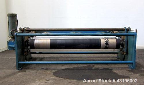 Used Nip Roll Assembly Consisting Of: (1) 10" Diameter x 84" long stationary metal roll, driven by a 3hp, 180 volt, 1750 rpm DC gear motor, ratio 15 to 1, (1) 10" diameter x 84" wide pneumatically ad...