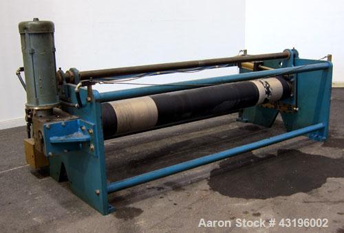 Used Nip Roll Assembly Consisting Of: (1) 10" Diameter x 84" long stationary metal roll, driven by a 3hp, 180 volt, 1750 rpm DC gear motor, ratio 15 to 1, (1) 10" diameter x 84" wide pneumatically ad...
