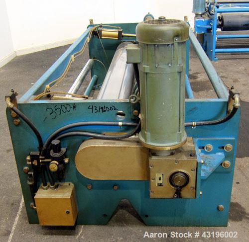 Used Nip Roll Assembly Consisting Of: (1) 10" Diameter x 84" long stationary metal roll, driven by a 3hp, 180 volt, 1750 rpm DC gear motor, ratio 15 to 1, (1) 10" diameter x 84" wide pneumatically ad...