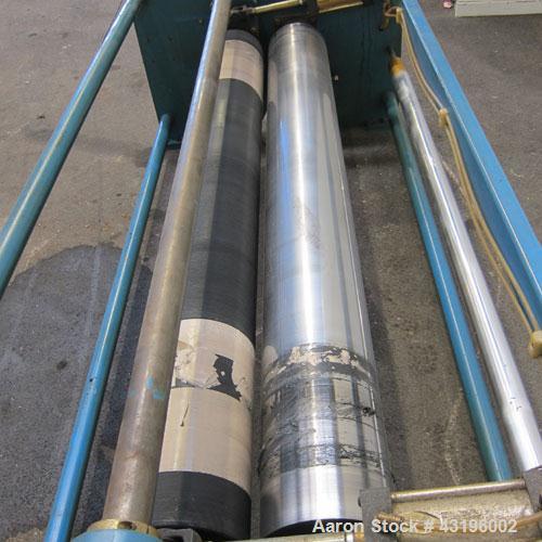Used Nip Roll Assembly Consisting Of: (1) 10" Diameter x 84" long stationary metal roll, driven by a 3hp, 180 volt, 1750 rpm DC gear motor, ratio 15 to 1, (1) 10" diameter x 84" wide pneumatically ad...