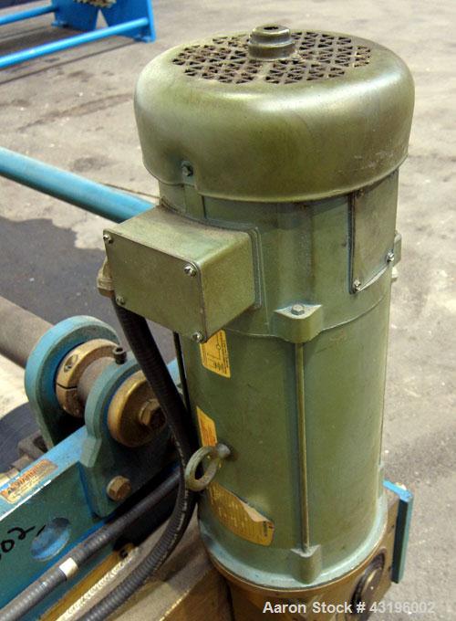Used Nip Roll Assembly Consisting Of: (1) 10" Diameter x 84" long stationary metal roll, driven by a 3hp, 180 volt, 1750 rpm DC gear motor, ratio 15 to 1, (1) 10" diameter x 84" wide pneumatically ad...
