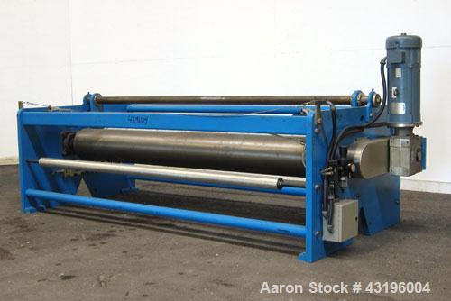 Used Nip Roll Assembly Consisting Of: (1) 10" Diameter x 84" long stationary metal roll, driven by a 3hp, 180 volt, 1750 rpm DC gear motor, ratio 15 to 1, (1) 10" diameter x 84" wide pneumatically ad...