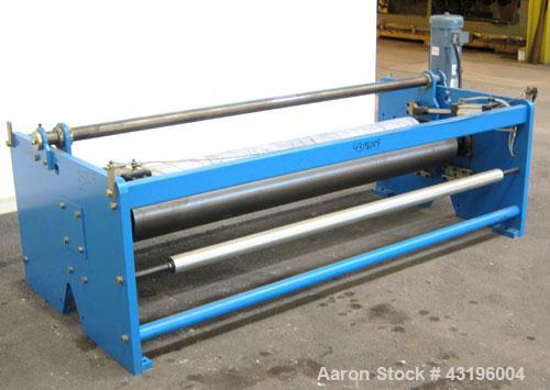 Used Nip Roll Assembly Consisting Of: (1) 10" Diameter x 84" long stationary metal roll, driven by a 3hp, 180 volt, 1750 rpm DC gear motor, ratio 15 to 1, (1) 10" diameter x 84" wide pneumatically ad...