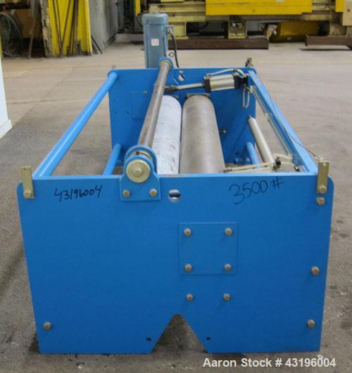 Used Nip Roll Assembly Consisting Of: (1) 10" Diameter x 84" long stationary metal roll, driven by a 3hp, 180 volt, 1750 rpm DC gear motor, ratio 15 to 1, (1) 10" diameter x 84" wide pneumatically ad...