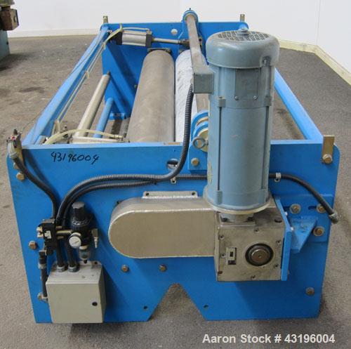 Used Nip Roll Assembly Consisting Of: (1) 10" Diameter x 84" long stationary metal roll, driven by a 3hp, 180 volt, 1750 rpm DC gear motor, ratio 15 to 1, (1) 10" diameter x 84" wide pneumatically ad...