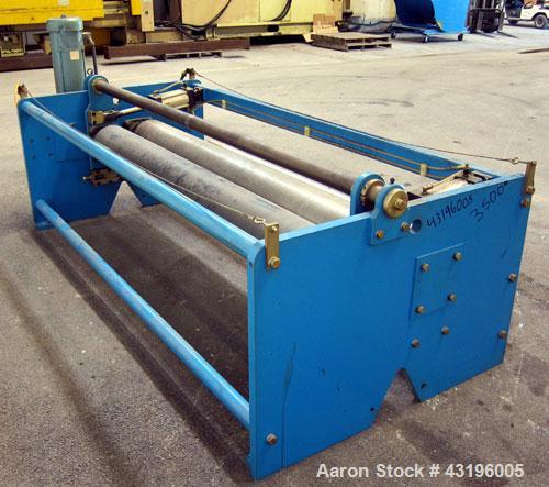 Used Nip Roll Assembly Consisting Of: (1) 10" Diameter x 84" long stationary metal roll, driven by a 3hp, 180 volt, 1750 rpm DC gear motor, ratio 15 to 1, (1) 10" diameter x 84" wide pneumatically ad...
