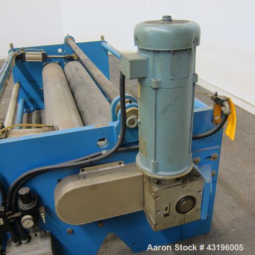 Used Nip Roll Assembly Consisting Of: (1) 10" Diameter x 84" long stationary metal roll, driven by a 3hp, 180 volt, 1750 rpm DC gear motor, ratio 15 to 1, (1) 10" diameter x 84" wide pneumatically ad...