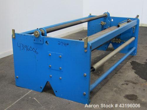 Used Nip Roll Assembly Consisting Of: (1) 10" Diameter x 84" long stationary metal roll. Missing drive, and rubber roll. Mounted on a carbon steel frame.