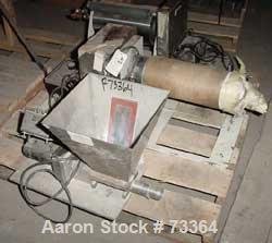 USED: Lab size casting unit consisting of (1) 9" diameter x 14" wide single chrome plated cored roll, driven by a 1/4 HP motor with controller. (1) 5" diameter x 18" long winder, driven by a 1/4 HP m...