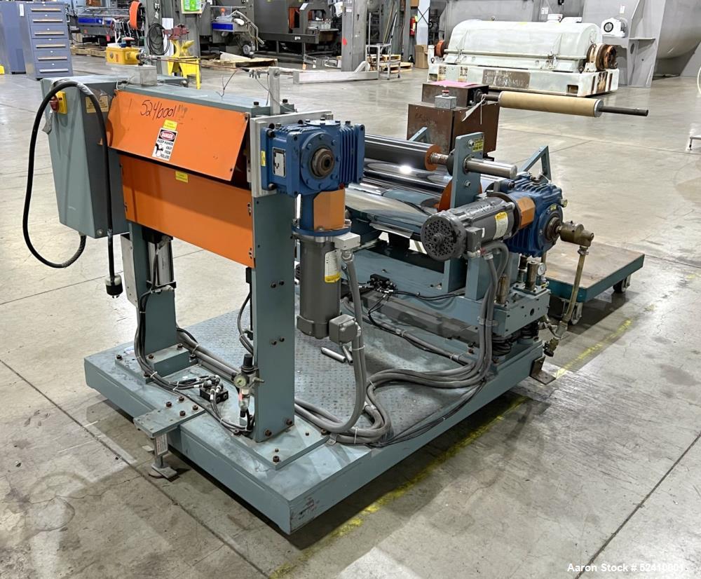 Used Davis Standard Cast Film Stand, Model KXE-1220. (2) 20" wide x 6" diameter feed rolls (1) chrome plated, (1) urethane. Driven by a .5hp 1750rpm motor, through reducer 30:1. (1) 20" wide x 4" dia...