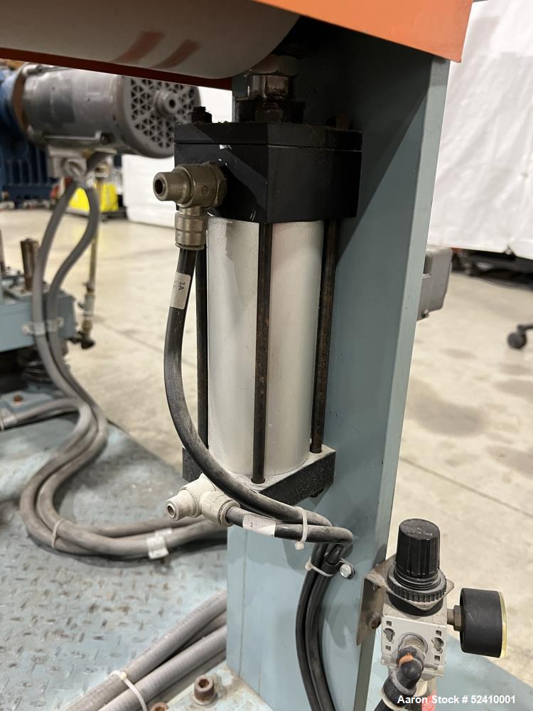 Used Davis Standard Cast Film Stand, Model KXE-1220. (2) 20" wide x 6" diameter feed rolls (1) chrome plated, (1) urethane. Driven by a .5hp 1750rpm motor, through reducer 30:1. (1) 20" wide x 4" dia...