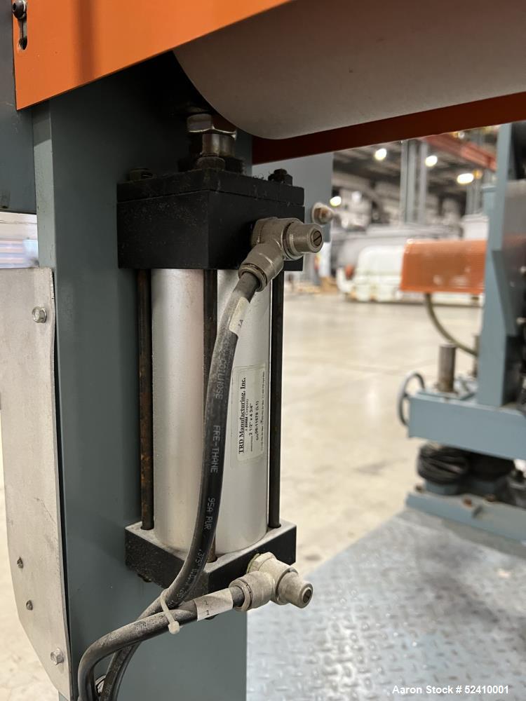 Used Davis Standard Cast Film Stand, Model KXE-1220. (2) 20" wide x 6" diameter feed rolls (1) chrome plated, (1) urethane. Driven by a .5hp 1750rpm motor, through reducer 30:1. (1) 20" wide x 4" dia...