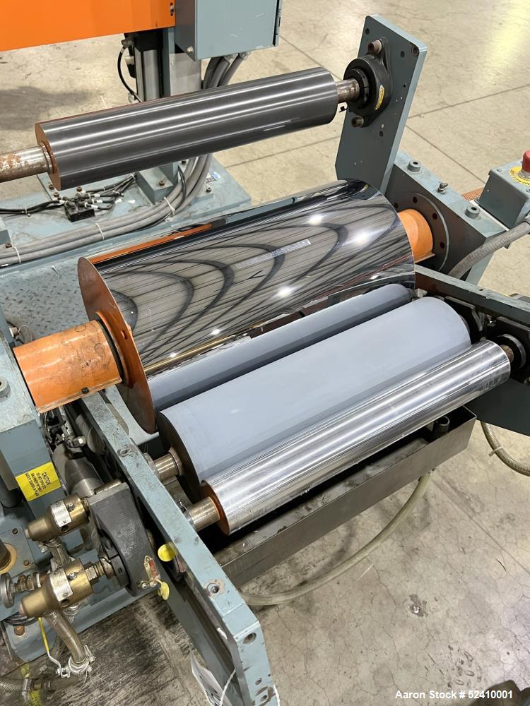 Used Davis Standard Cast Film Stand, Model KXE-1220. (2) 20" wide x 6" diameter feed rolls (1) chrome plated, (1) urethane. Driven by a .5hp 1750rpm motor, through reducer 30:1. (1) 20" wide x 4" dia...
