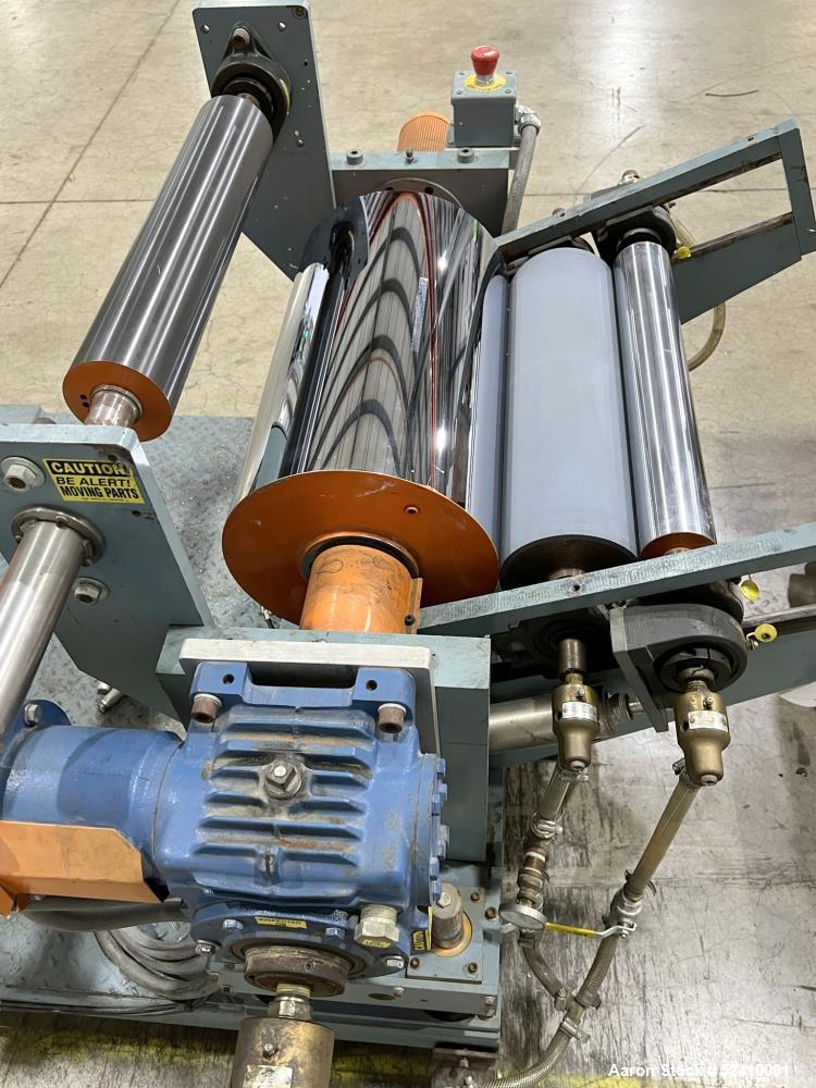 Used Davis Standard Cast Film Stand, Model KXE-1220. (2) 20" wide x 6" diameter feed rolls (1) chrome plated, (1) urethane. Driven by a .5hp 1750rpm motor, through reducer 30:1. (1) 20" wide x 4" dia...