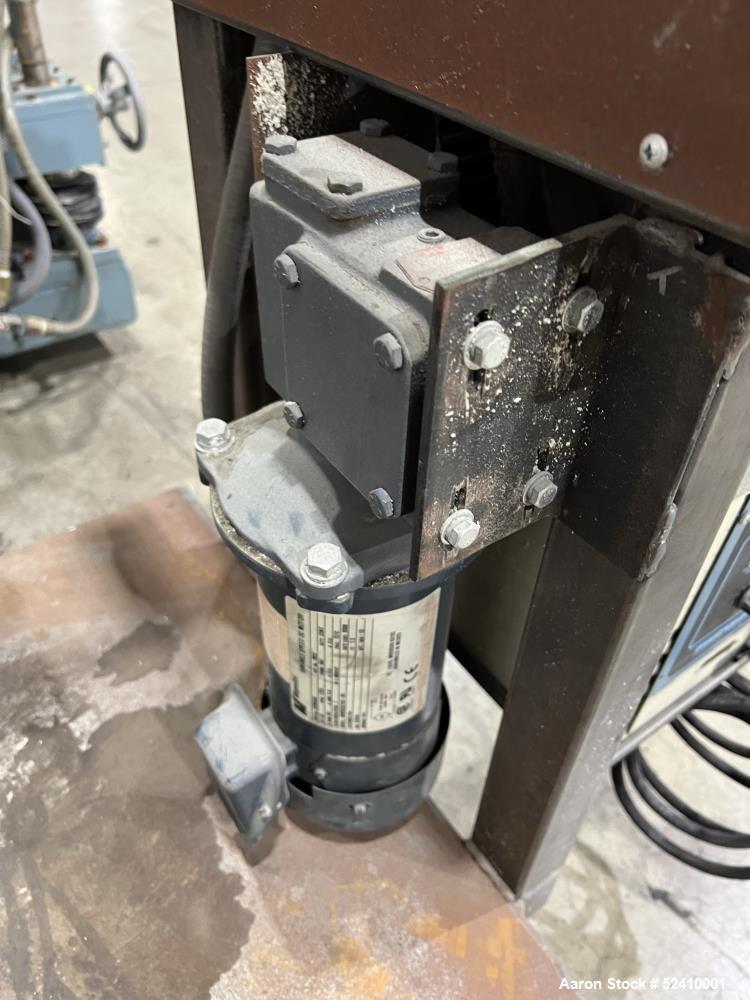 Used Davis Standard Cast Film Stand, Model KXE-1220. (2) 20" wide x 6" diameter feed rolls (1) chrome plated, (1) urethane. Driven by a .5hp 1750rpm motor, through reducer 30:1. (1) 20" wide x 4" dia...