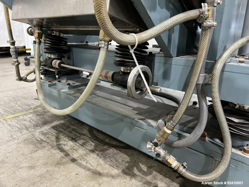 Used Davis Standard Cast Film Stand, Model KXE-1220. (2) 20" wide x 6" diameter feed rolls (1) chrome plated, (1) urethane. Driven by a .5hp 1750rpm motor, through reducer 30:1. (1) 20" wide x 4" dia...