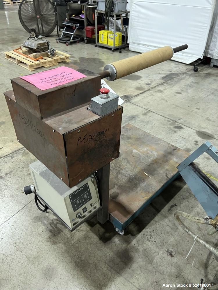 Used Davis Standard Cast Film Stand, Model KXE-1220. (2) 20" wide x 6" diameter feed rolls (1) chrome plated, (1) urethane. Driven by a .5hp 1750rpm motor, through reducer 30:1. (1) 20" wide x 4" dia...