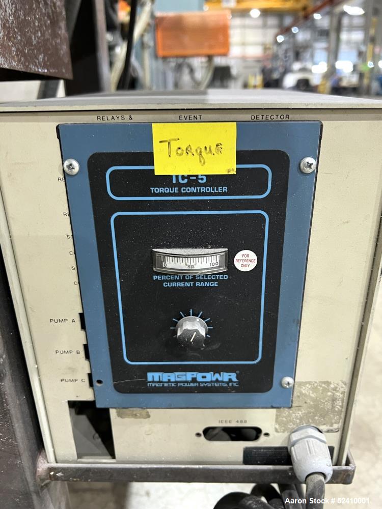 Used Davis Standard Cast Film Stand, Model KXE-1220. (2) 20" wide x 6" diameter feed rolls (1) chrome plated, (1) urethane. Driven by a .5hp 1750rpm motor, through reducer 30:1. (1) 20" wide x 4" dia...