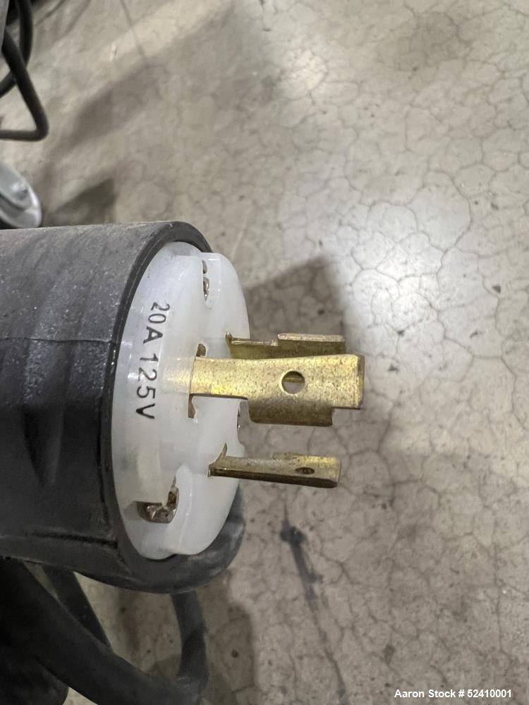Used Davis Standard Cast Film Stand, Model KXE-1220. (2) 20" wide x 6" diameter feed rolls (1) chrome plated, (1) urethane. Driven by a .5hp 1750rpm motor, through reducer 30:1. (1) 20" wide x 4" dia...