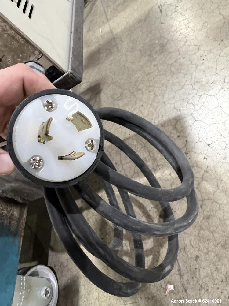 Used Davis Standard Cast Film Stand, Model KXE-1220. (2) 20" wide x 6" diameter feed rolls (1) chrome plated, (1) urethane. Driven by a .5hp 1750rpm motor, through reducer 30:1. (1) 20" wide x 4" dia...