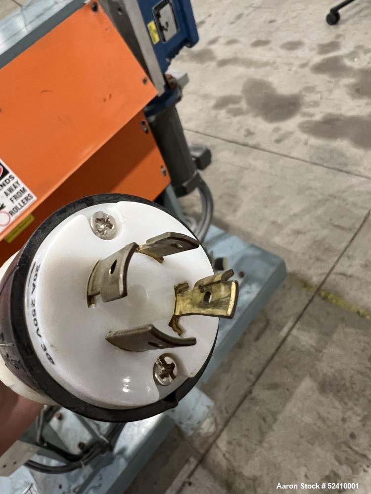 Used Davis Standard Cast Film Stand, Model KXE-1220. (2) 20" wide x 6" diameter feed rolls (1) chrome plated, (1) urethane. Driven by a .5hp 1750rpm motor, through reducer 30:1. (1) 20" wide x 4" dia...