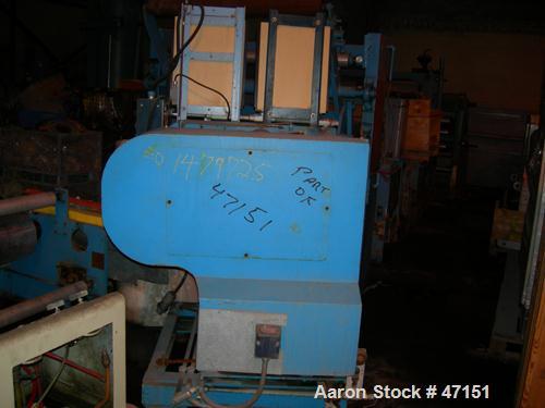USED: Egan 12" dia x 28" face single roll cast unit. Double roll capable. Cored roll for cooling. With fractional hp drive vr Model 7000 adjustable frequency drive controllers, tensioning stand havin...
