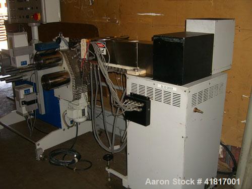Used Haake Rheomex Lab Cast Film Line with OCS film analyzer. (1) 3/4" Haake lab extruder, 24:1 L/D ratio, model 27-13-100. 6 Eurotherm 2132 temperature controls, Dynisco pressure transducer, 6" adju...