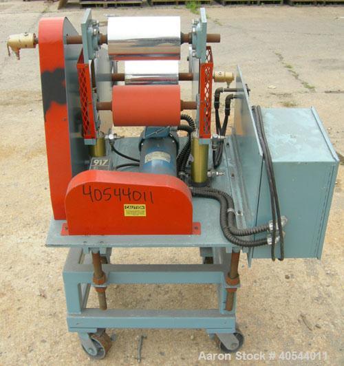 Used Killion Single Roll Cast Film Station. Chrome plated cored roll 8" diameter x 8" wide. Includes (1) 5" diameter x 8" wide rubber roll, (1) 5" diameter x 8" wide chrome plated roll. All rolls are...