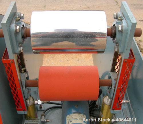 Used Killion Single Roll Cast Film Station. Chrome plated cored roll 8" diameter x 8" wide. Includes (1) 5" diameter x 8" wide rubber roll, (1) 5" diameter x 8" wide chrome plated roll. All rolls are...