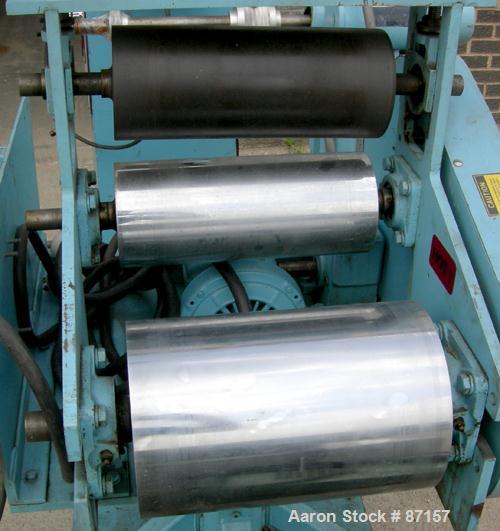 Used Killion 12" Wide Cast Film Take Off. (1) 8" diameter x 12" wide chrome plated cored roll. (2) 5" diameter x 12" wide pull rolls, (1) rubber, (1) metal, pneumatically adjustable, all driven by a ...