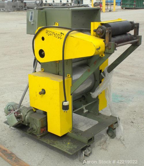 Used 15" Wide Cast Film Roll Stand. (2) 15" wide x 12" diameter chrome plated rolls. (2) 4" diameter x 12" wide rubber pull rolls, driven by a 1/2 hp, 3/60/230/460 volt, 50-1600 rpm motor. Mounted on...