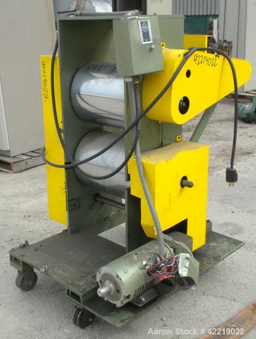 Used 15" Wide Cast Film Roll Stand. (2) 15" wide x 12" diameter chrome plated rolls. (2) 4" diameter x 12" wide rubber pull rolls, driven by a 1/2 hp, 3/60/230/460 volt, 50-1600 rpm motor. Mounted on...