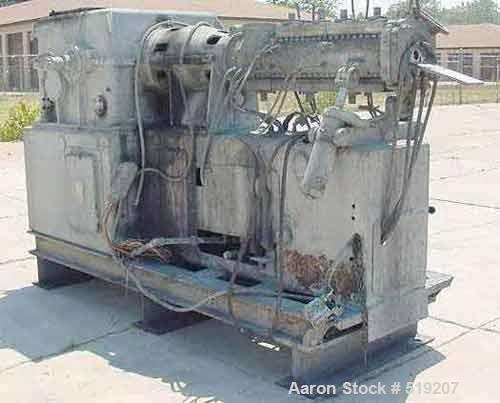 USED: Buss extruder. This unit has a clamshell barrel, 5.75" diameter,5.5" round feed throat and 40.5" from end of barrel to center of feedthroat. The end of barrel has a bolt-on gate. There is a cra...