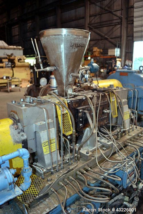 Used Compounding Line Consisting Of: (1) Farrel size 4LMSD Continuous Mixer. Modified top feed, side discharge. Oil heated, over-under rotor design. Driven by a 150hp, 500 volt, 1750 rpm DC motor thr...